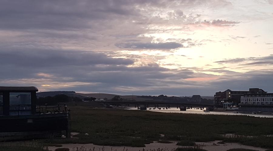 Sunset at Shoreham over the Adur towards Lancing College