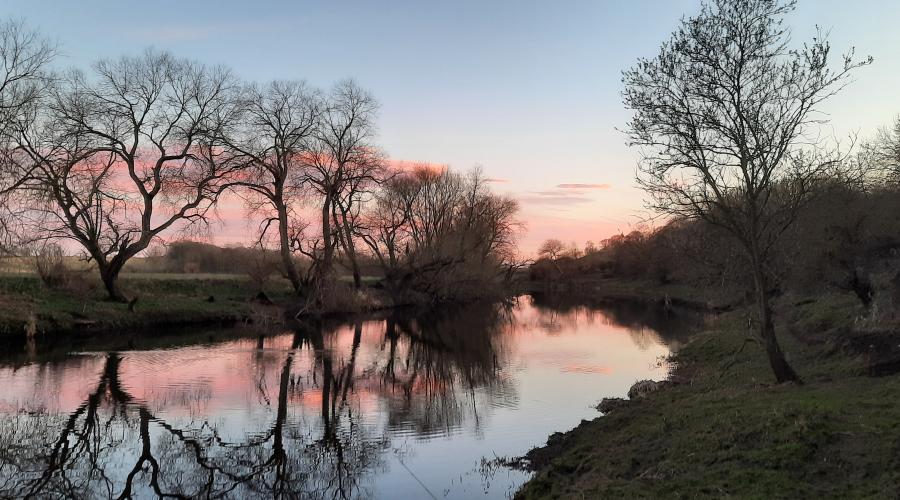 River Tees at sunset,pink sky.
