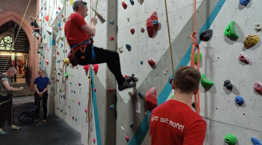 a climber being lowered down