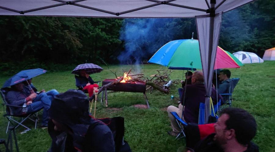 Evening campfire in the rain