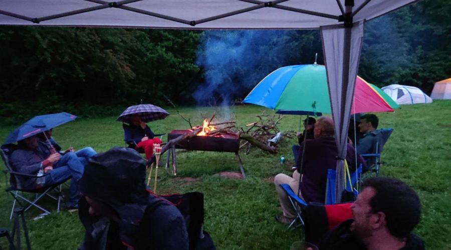 Evening campfire in the rain