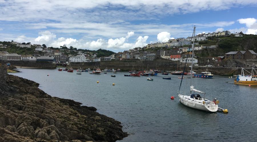 Harbour at Mevagissey with boats in the water 