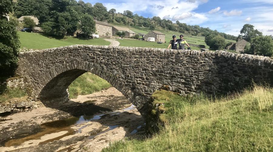 Cyclists on a bridge