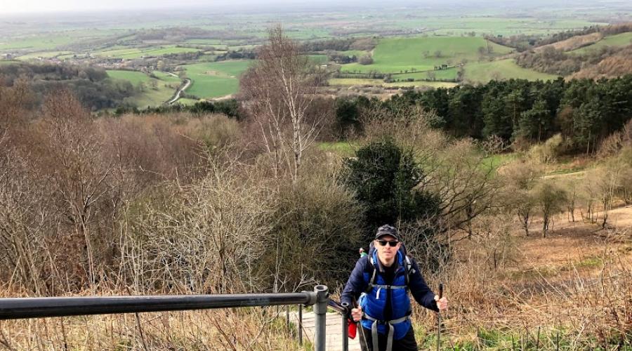 OutdoorLads member climbing the steps at the start of route