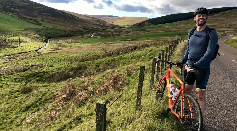 Steve cycling on North side of Mennock pass
