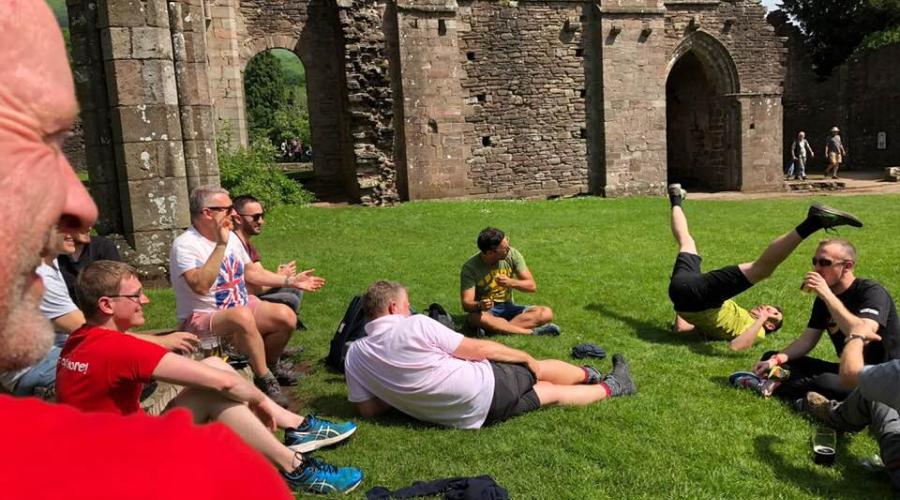 Walkers relaxing at Llanthony Priory