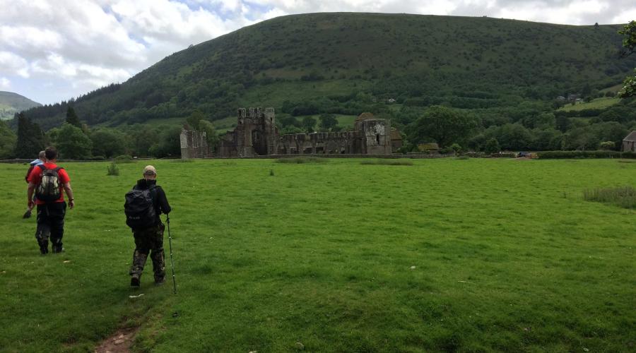 Walkers heading back to Llanthony Priory