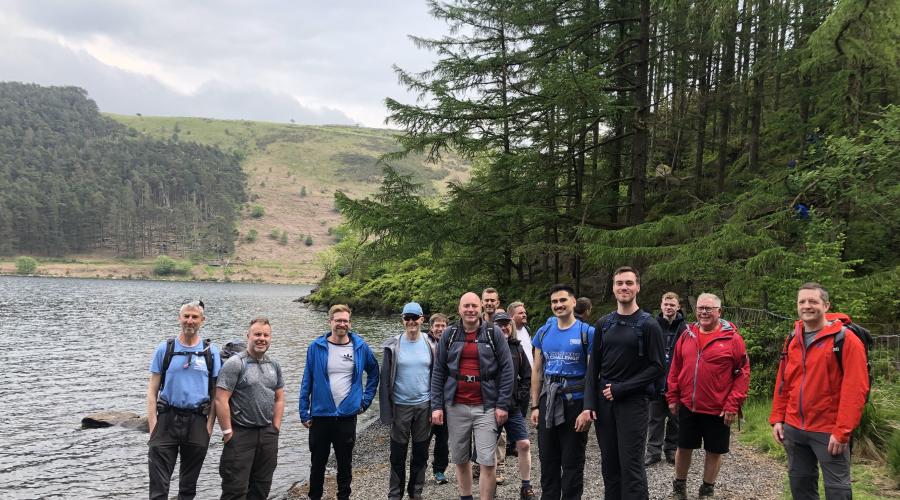 group photo infront of lake