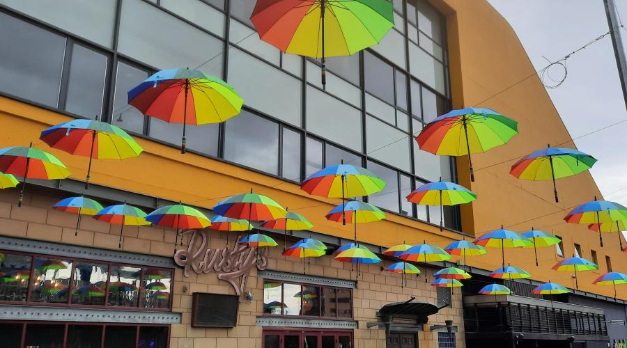 View of bar with Rainbow umbrellas