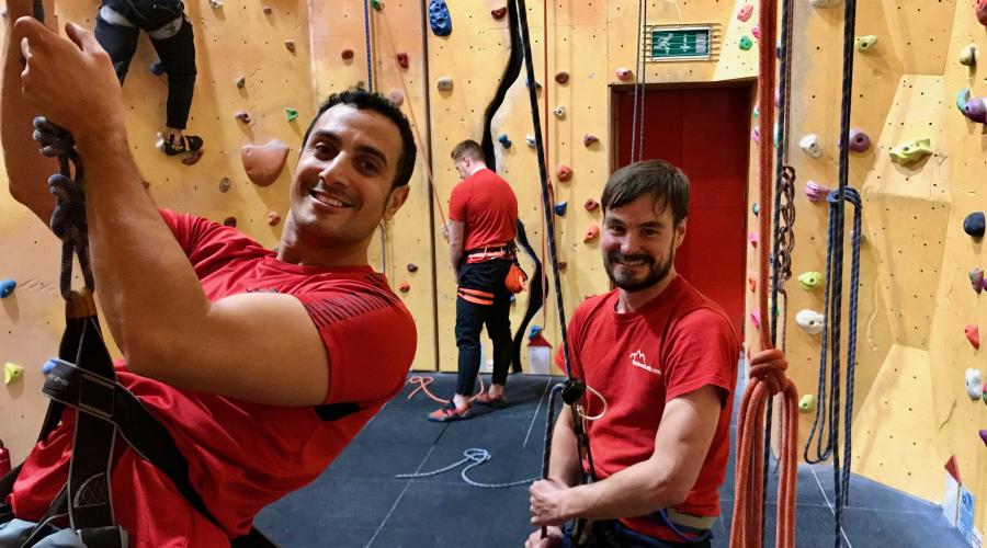 Two smiling climbers at Redpoint climbing centre