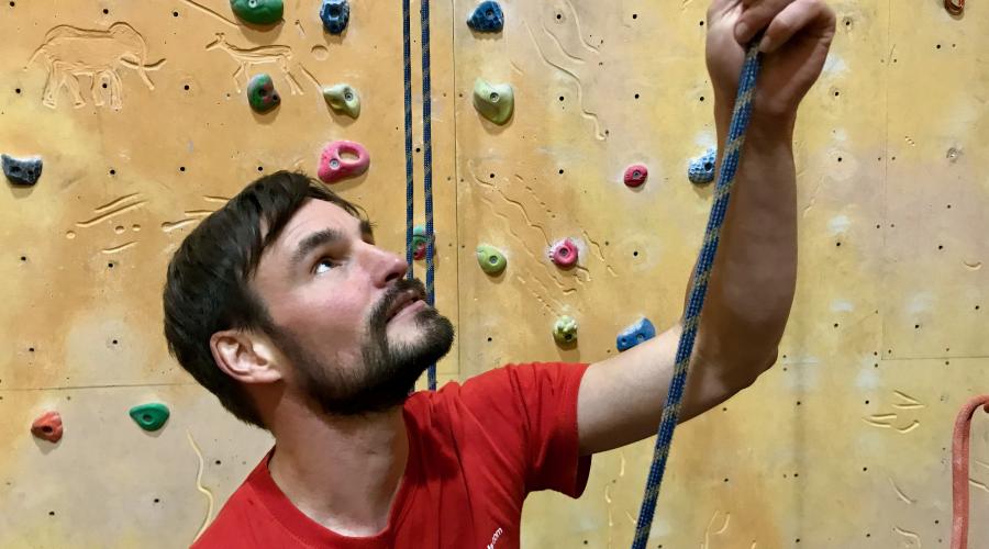 Person belaying a climber