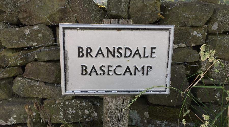Look for this sign by the bend in the road - see directions