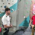 cheerful climbers getting ready