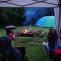 Evening campfire in the rain