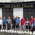 hikers in front of pub