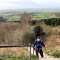 OutdoorLads member climbing the steps at the start of route