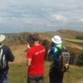 Hadrians Wall view with OutdoorLads assessing the vista