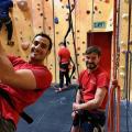 Two smiling climbers at Redpoint climbing centre