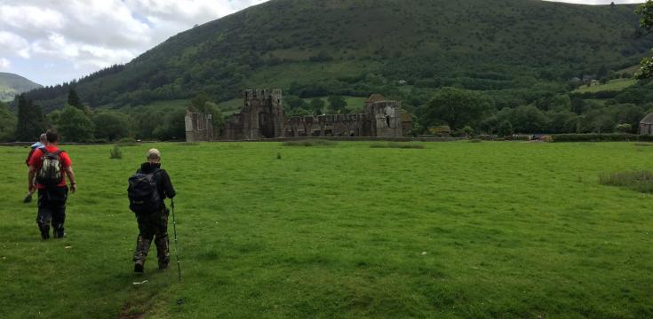 Walkers heading back to Llanthony Priory
