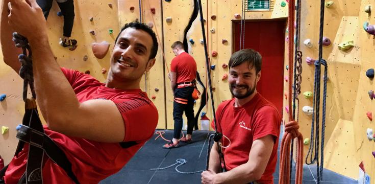 Two smiling climbers at Redpoint climbing centre