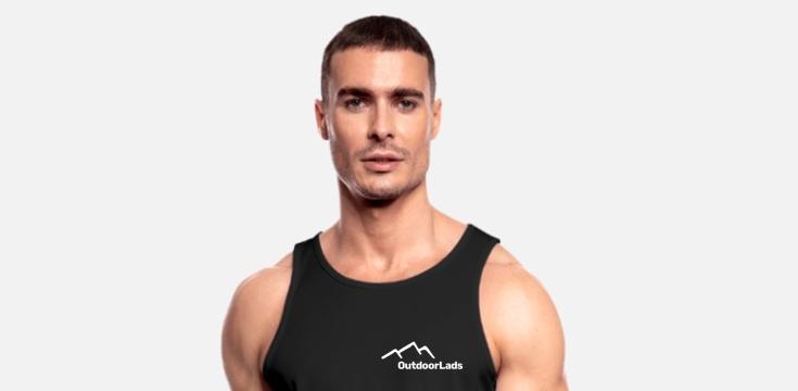 man in a vest with OutdoorLads logo on left breast