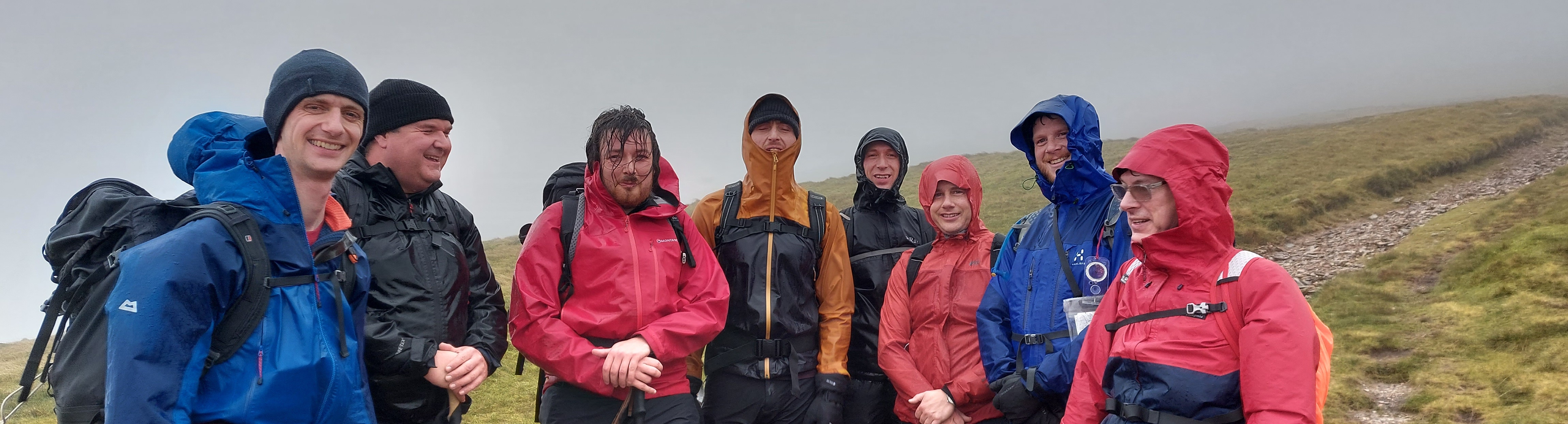OutdoorLads Members in waterproof jackets in the rain